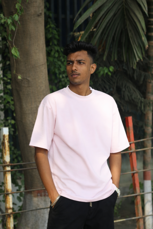 baby-pink-oversize-drop-shoulder-tshirt-denim-plus Baby pink oversize drop shoulder t-shirt streetwear style by Denim Plus